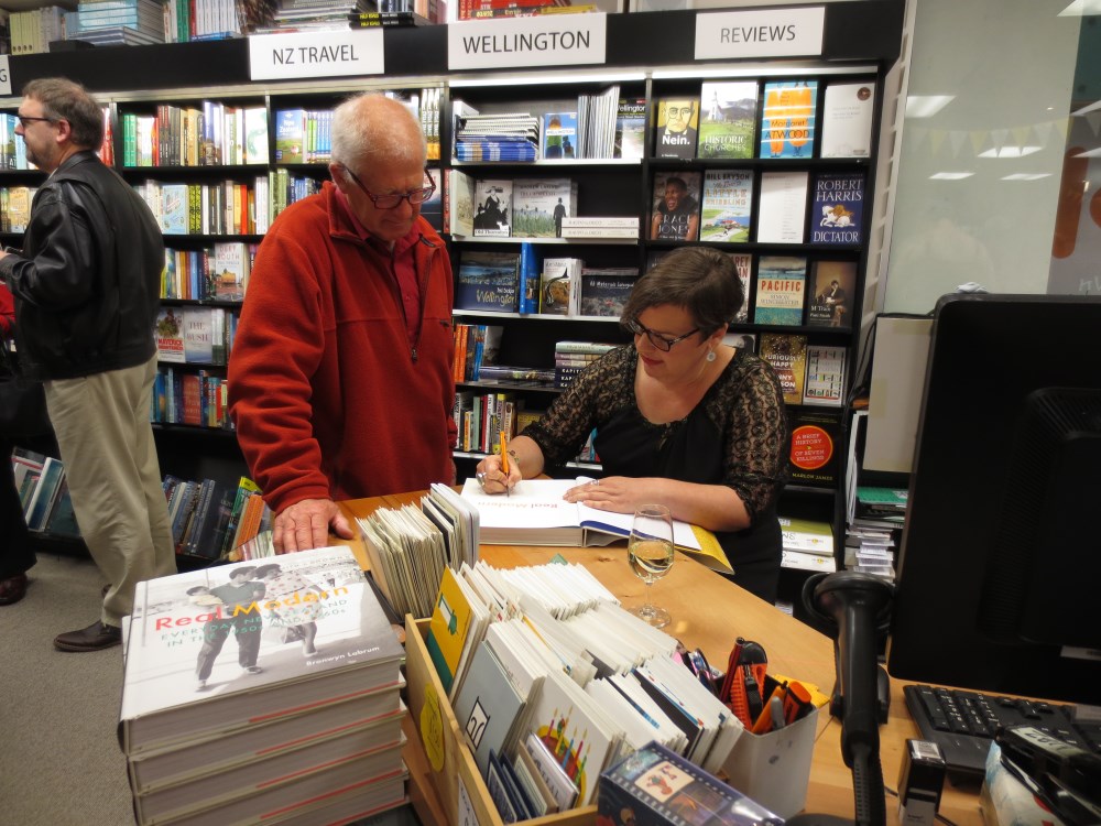 Bronwyn signing copies of her book.